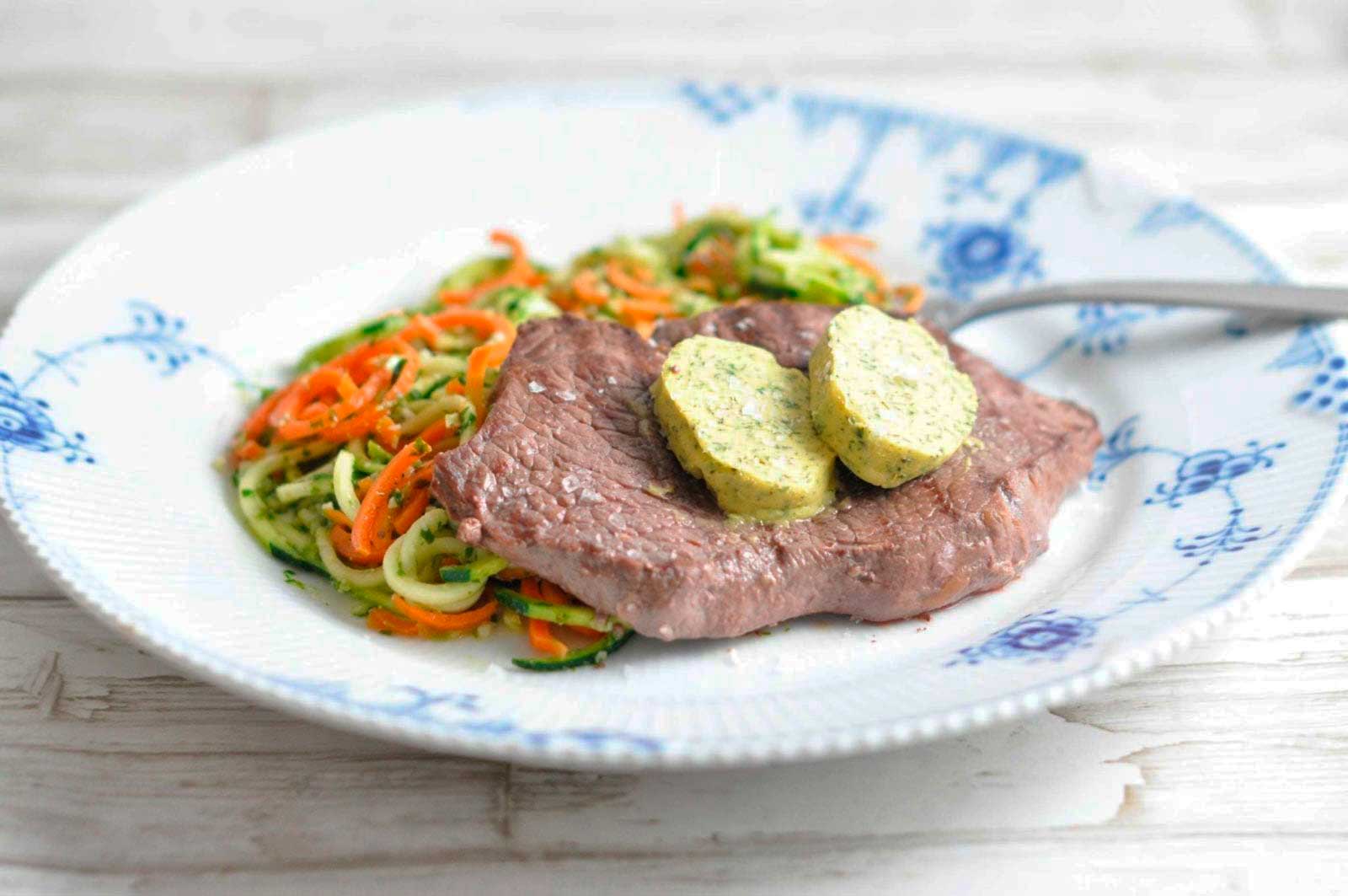 Steak with bearnaise butter and carrot and zucchini spaghetti