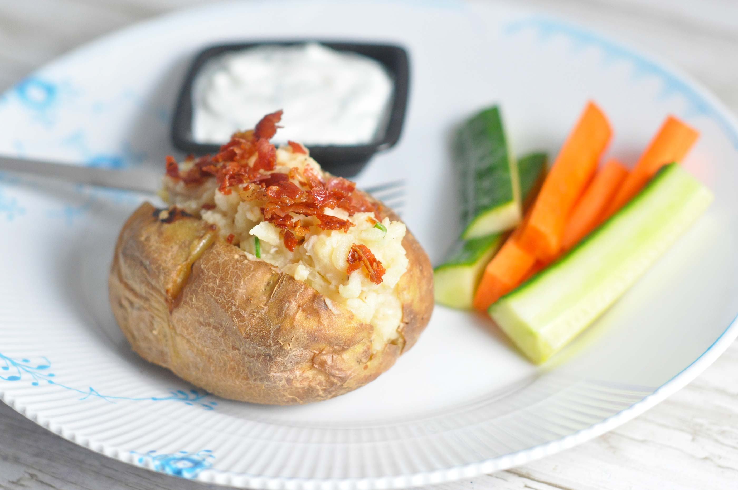 Stuffed jacket potatoes with chicken, skyr and crispy parma