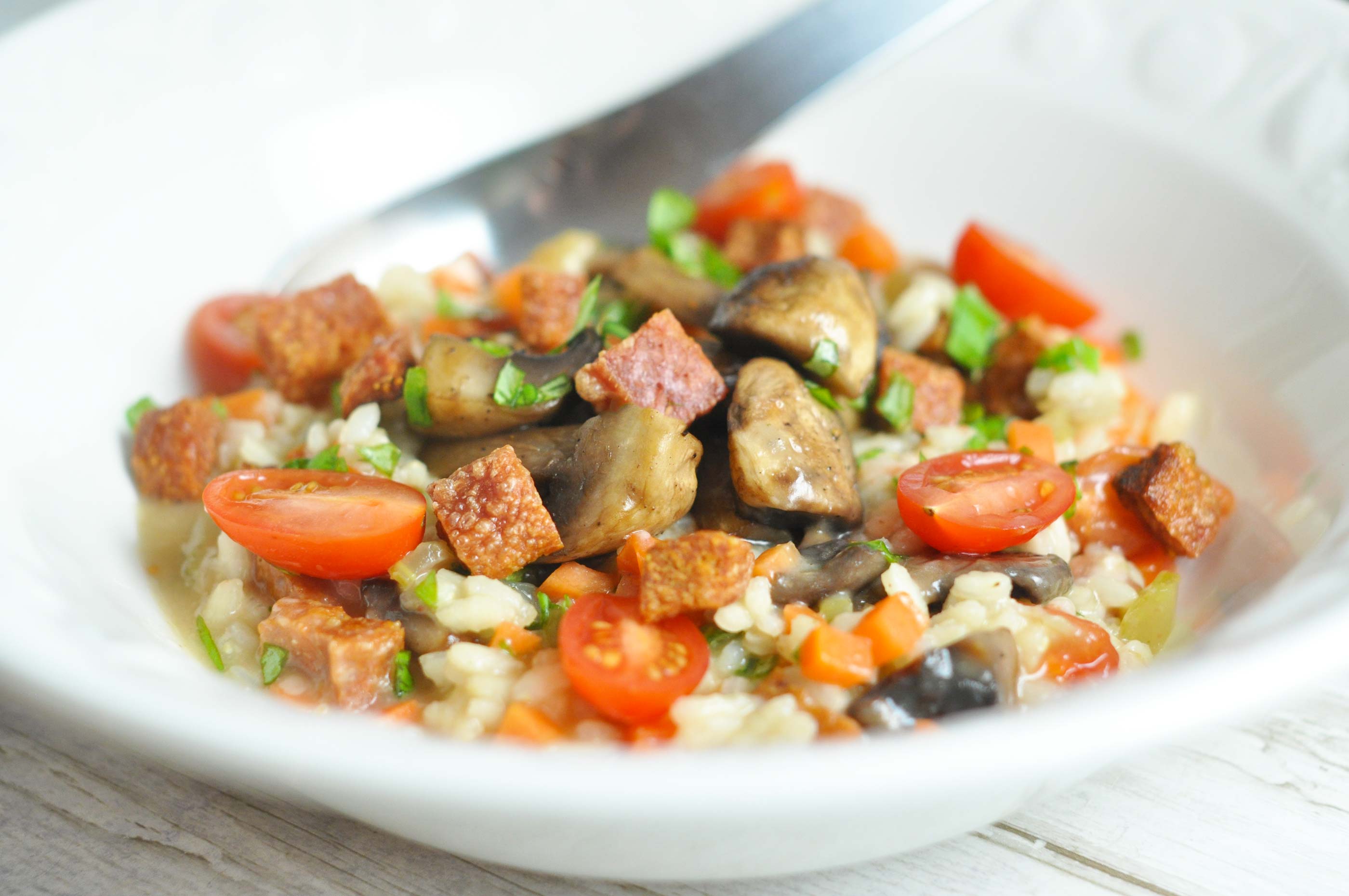 Tasty risotto with crispy chorizo, mushrooms and veggies