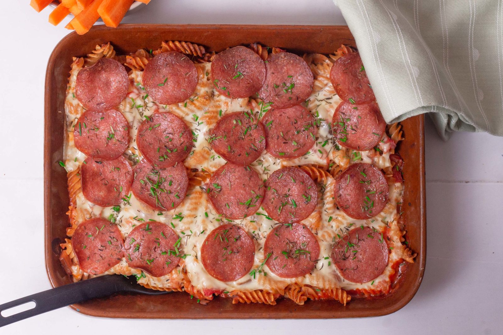 Pasta a la pizza - topped with pepperoni and cheese