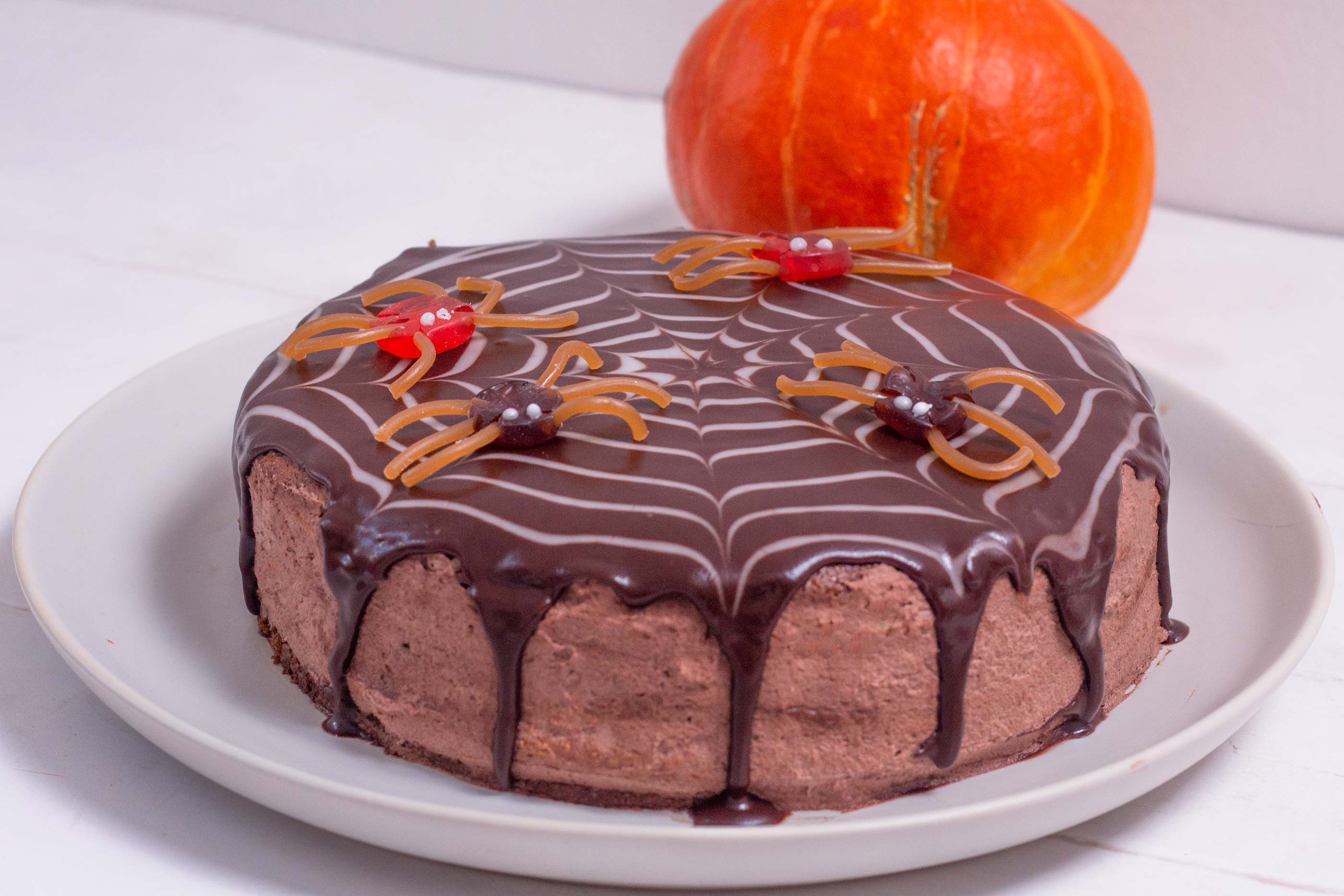 Easy Halloween layer cake with raspberries and chocolate