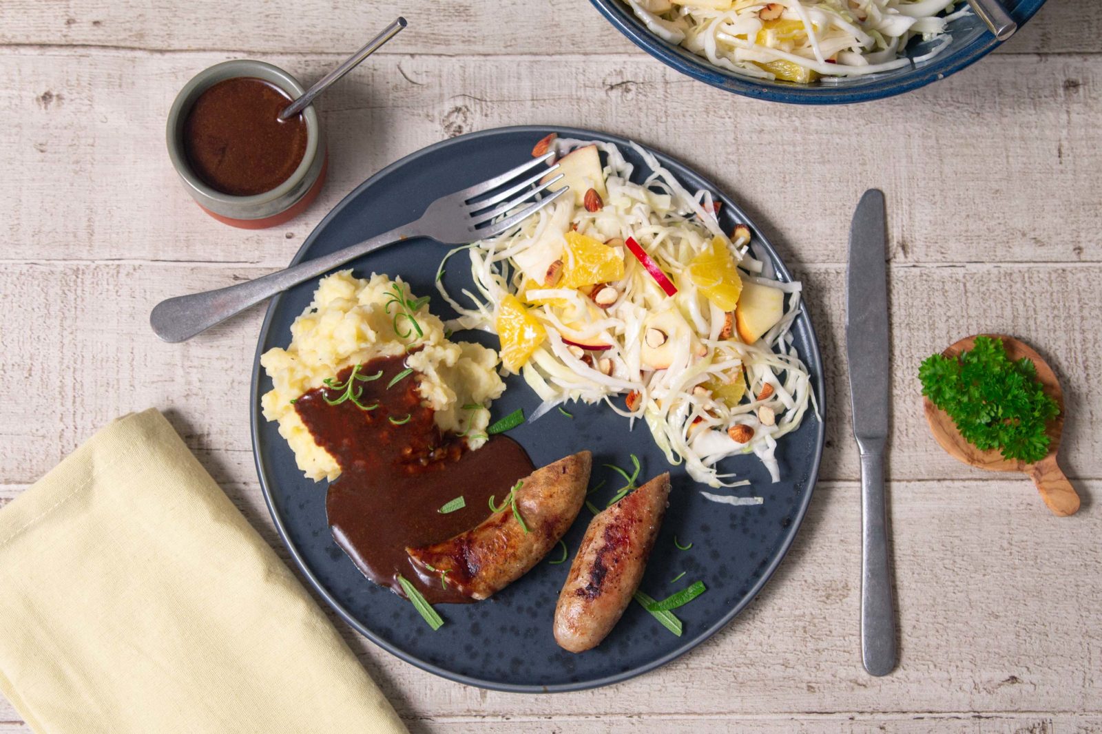 Dinner sausage with Jerusalem artichoke mash, gravy and crispy salad