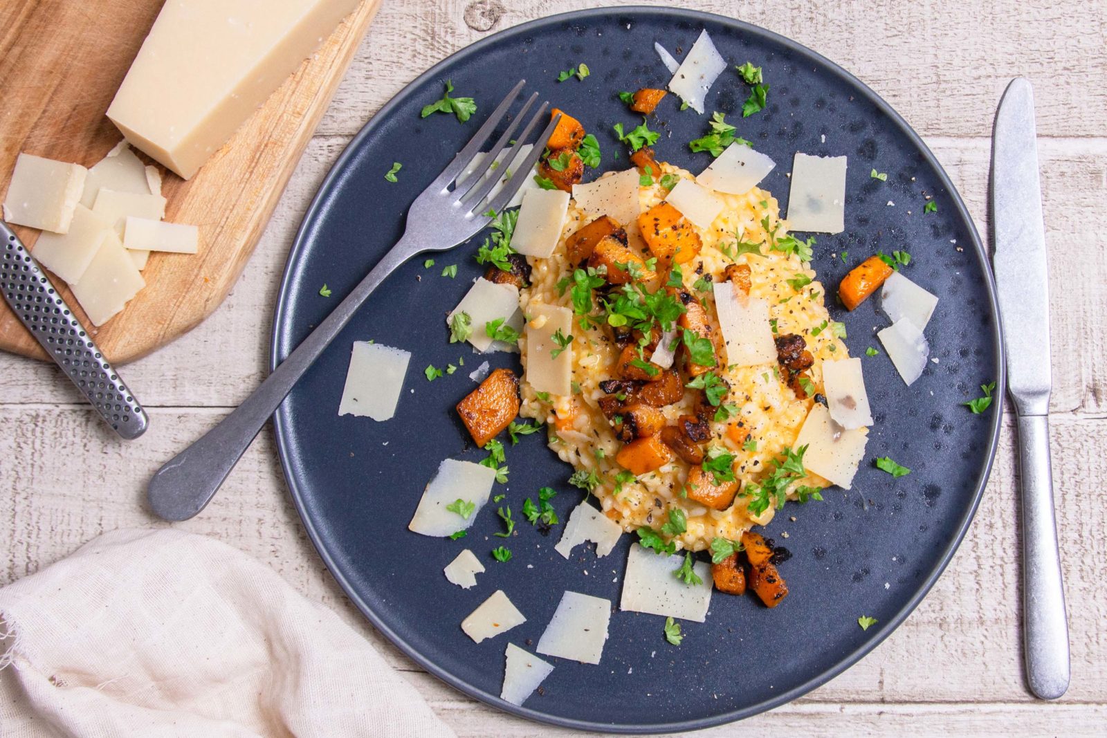 Simple white wine risotto with pumpkin, parmesan and thyme