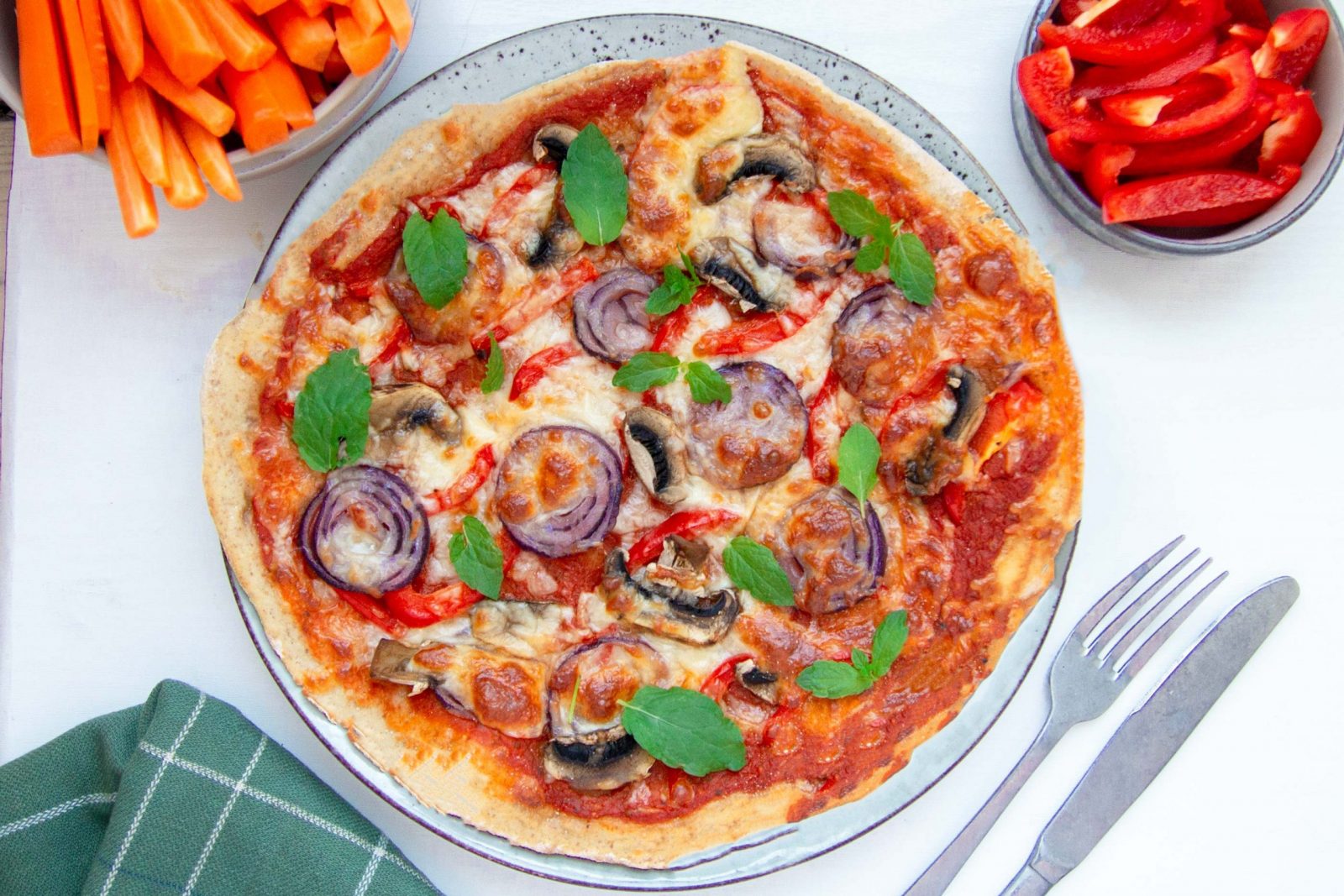 Veggie pizza with bell pepper, onion and mushroom